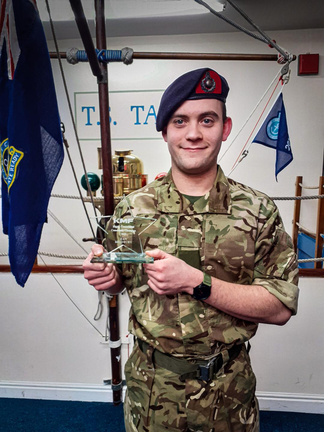 Volunteer scoops award for work with Royal Marines Cadets