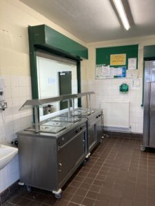 Servery area in kitchen, looking run down before works commenced.