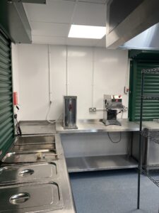 Servery area after completion. More surfaces, new flooring and better lighting.