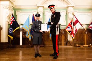 Lord-Lieutenant Cadet receiving award from Lord-Lieutenant.