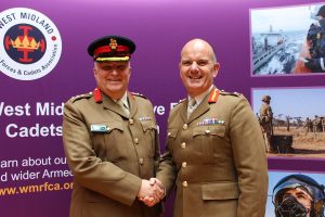 Colonel Sarling and Major General Marc Overton shaking hands after Colonel Sarling's 5th clasp presentation.