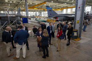 Employers are gathered together in the hangar surrounded by aircraft, networking and learning about the history of the station and the aircraft on display.